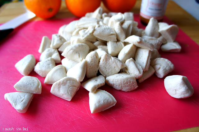 Biscuit dough fourths in a pile 