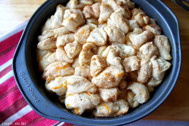 Baked Orange Cinnamon Pull Aparts in a round baking pan