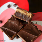 Three Peanut Butter Fudge Brownies on a plate