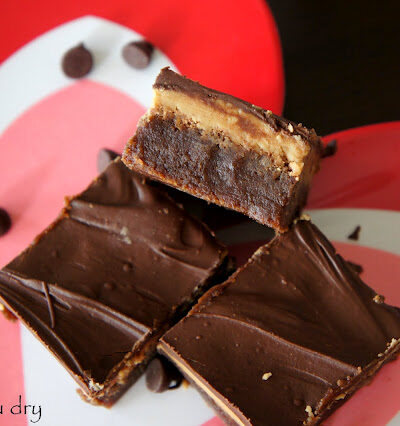 Three Peanut Butter Fudge Brownies on a plate