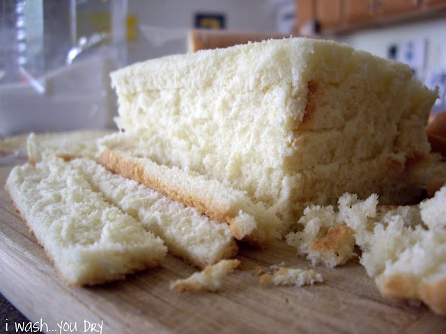 A stack of bread slices with the crust cut off. 