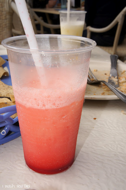 A close up of a drink in a plastic cup. 