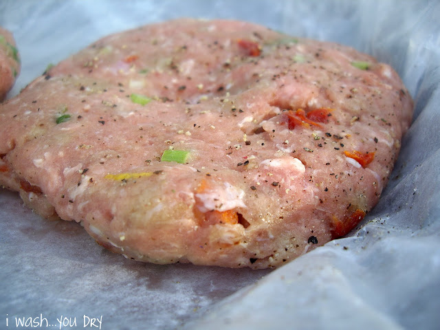 A raw garden turkey Pattie on parchment paper. 