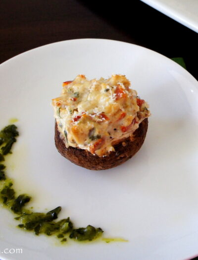 A stuffed mushroom displayed on a plate