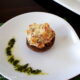 A stuffed mushroom displayed on a plate