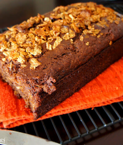 A loaf of Banana Nutella Crunch Breadon a cooling rack