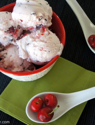 A close up of a bowl with scoops of Dark Chocolate Covered Cherry Frozen Yogurt