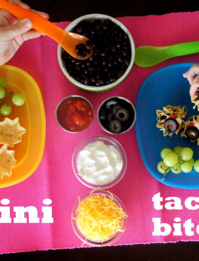 Mini Taco Bites and fixings showcased on a table with little hands making them