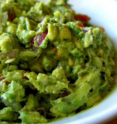 A close up of a bowl of guacamole.