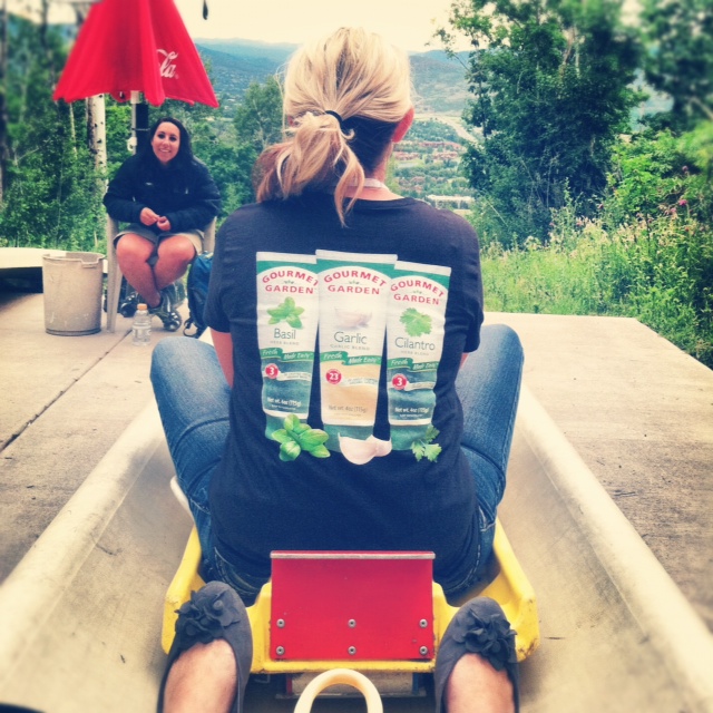 The back of Shawn from I Wash You Dry going down the Alpine Slide