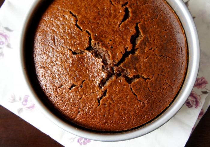 A look down on a baked cake in a pan