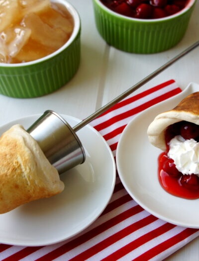 A display of campfire tarts on plates with filling options