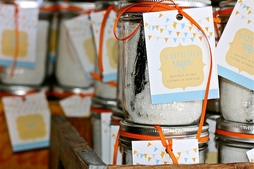 Stacked mason jars with Homemade Vanilla sugar and gift tags attached to each