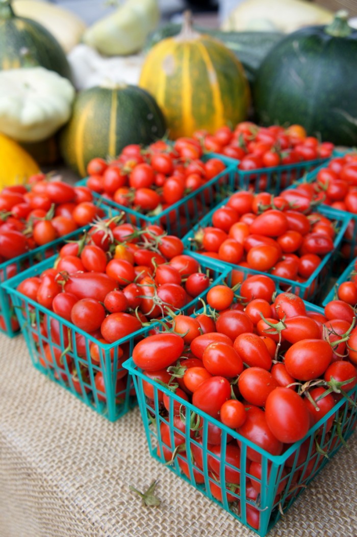 Baskets of cherry tomatoes on a table