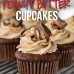 These Chocolate Peanut Butter Cupcakes with Peanut Butter Buttercream Frosting are filled with a surprise center that's sure to make you smile!