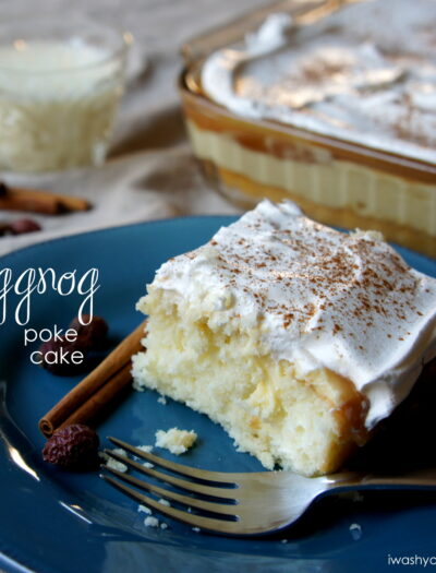 A piece of Eggnog Poke Cake on a plate