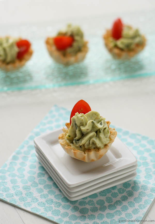 A close up of a mini tart appetizer