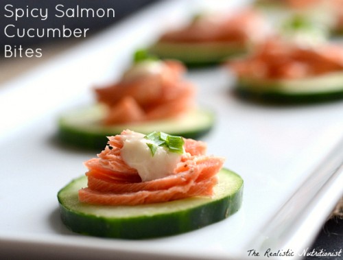 A close up of a slice of cucumber appetizer