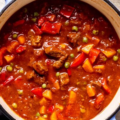 Cooked beef curry stew in ceramic pot.