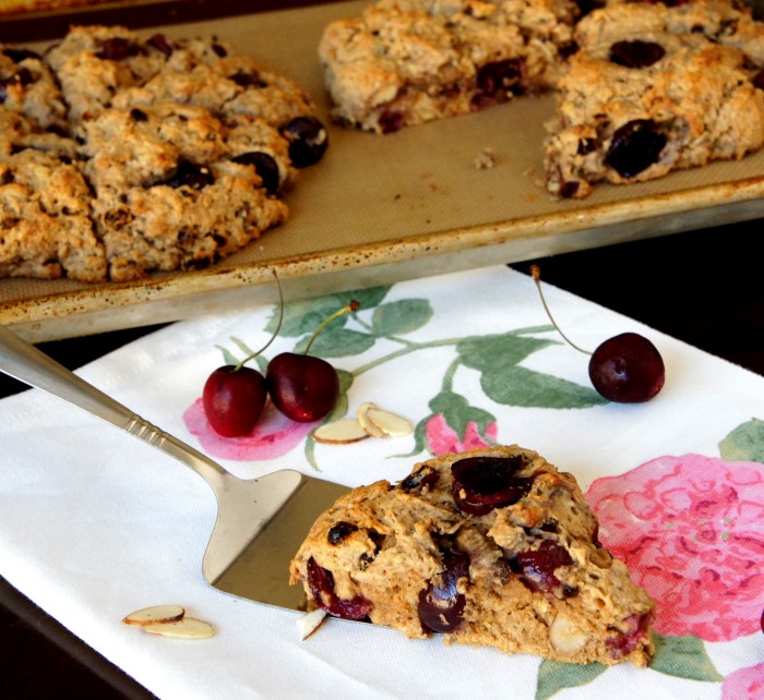 A close up of slice of Cherry Almond Scone