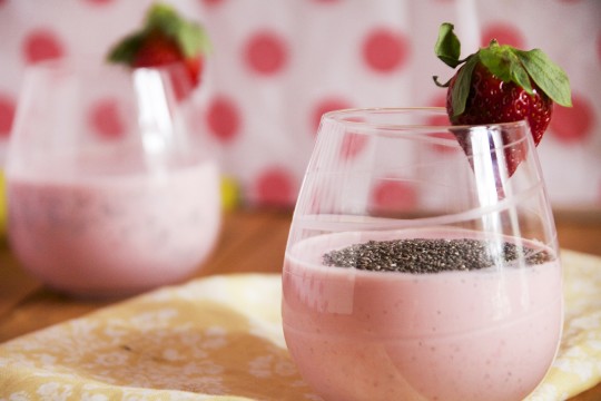 A close up of a smoothie in a glass cup