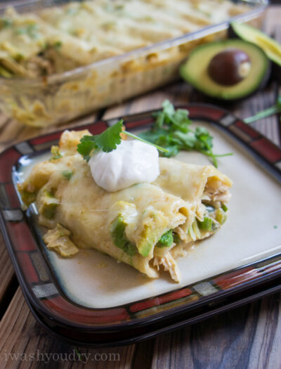 Creamy White Chicken and Avocado Enchiladas