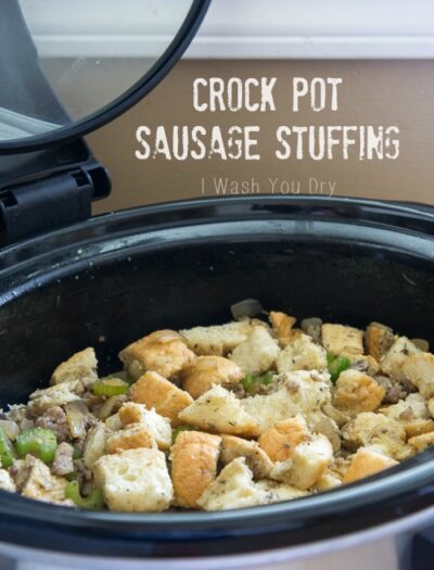 Food in a crockpot titled, "Crock Pot Sausage Stuffing"