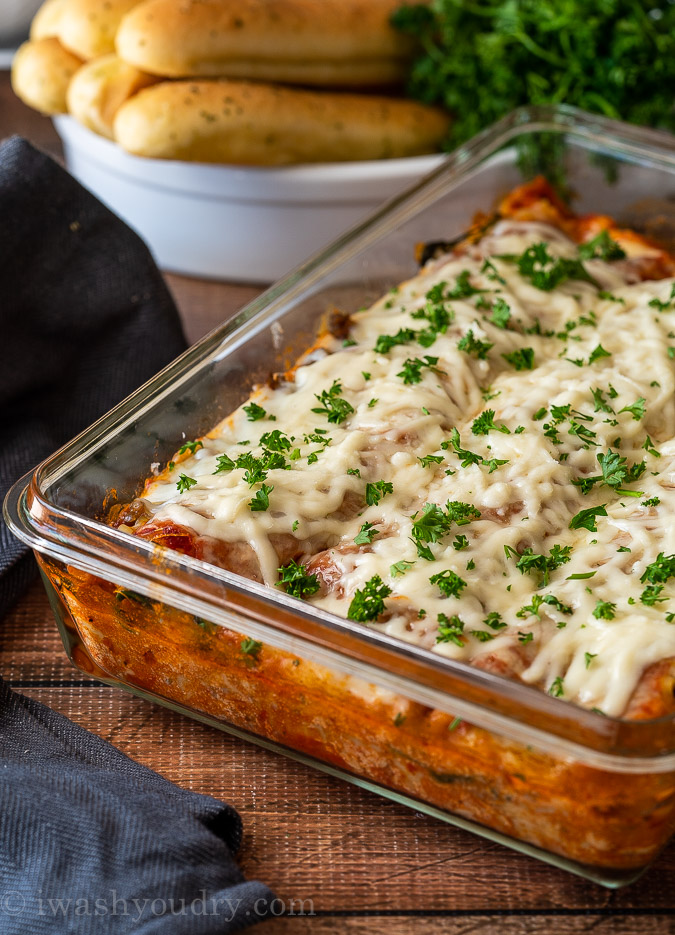 This Classic Lasagna Recipe is filled with Italian sausage, spinach and a creamy ricotta cheese filling. It's a classic Italian dish that's perfect for Sunday supper and even great for freezing!