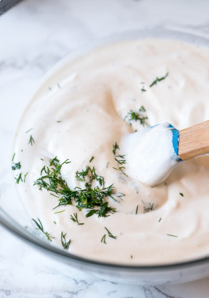 The dressing to this creamy Greek Pasta Salad is made with a mixture of greek yogurt, mayo and loads of fresh dill and lemon for extra bright flavors.