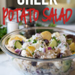 This creamy Greek Potato Salad is filled with tender potatoes, crunchy cucumbers, kalmata olives, feta cheese and red onion in a creamy dill sauce that's to die for! The perfect summer potato salad!