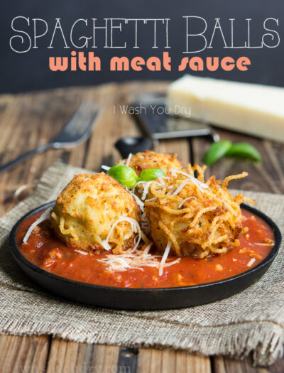 Spaghetti Balls with Meat Sauce! Spaghetti is combined with a cheesy mixture then formed into balls and fried until golden brown, then placed on top of a rich and hearty meat sauce.