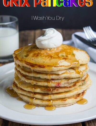 Trix Pancakes! These yummy pancakes are infused with Trix cereal flavor and swirled with little bits of Trix as well. It's a fruity pancake explosion!