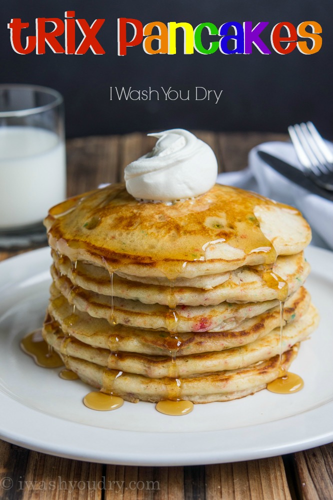 Trix Pancakes! These yummy pancakes are infused with Trix cereal flavor and swirled with little bits of Trix as well. It's a fruity pancake explosion! 