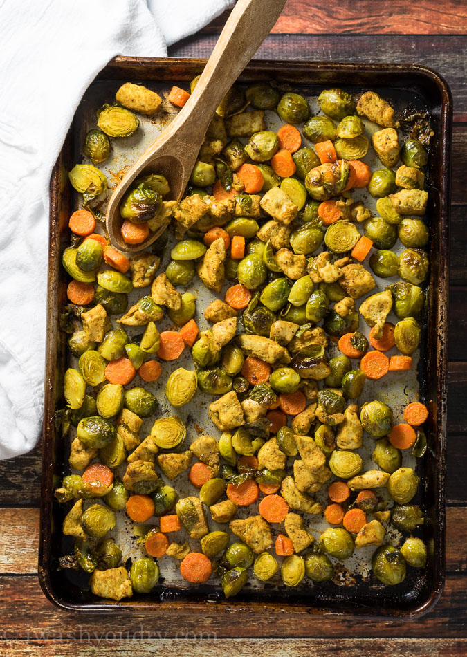 Curry Roasted Chicken and Brussel Sprouts over a creamy parsnip mash and topped with a creamy yellow curry sauce. A #lowcarb easy dinner that comes together in minutes! 