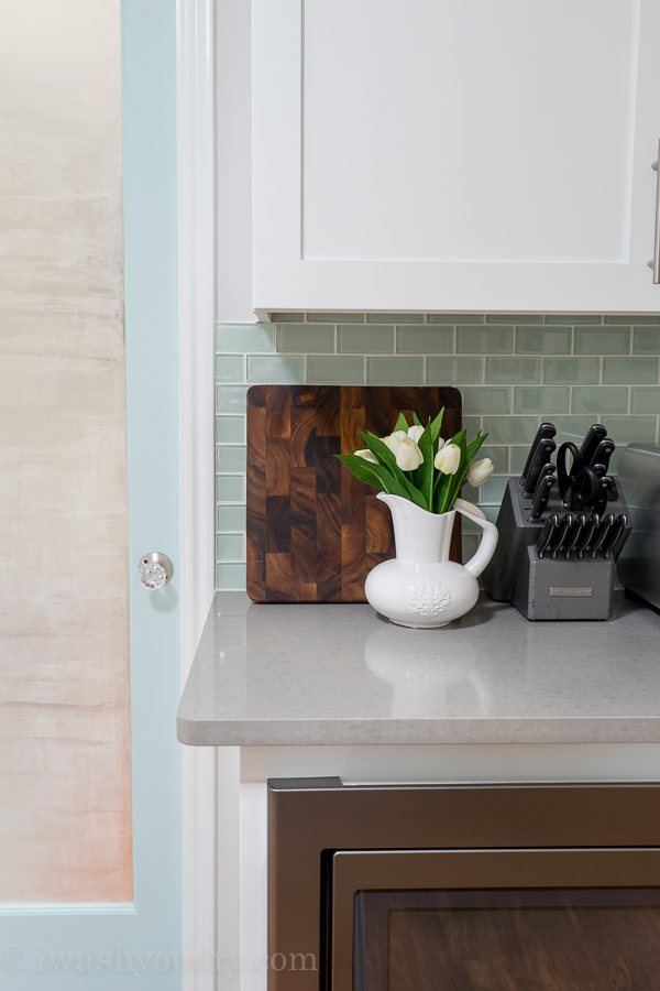 Gorgeous backsplash tile in Arctic Ice. Love the white shaker style cabinets and Slate appliances by GE. Dream kitchen!! 