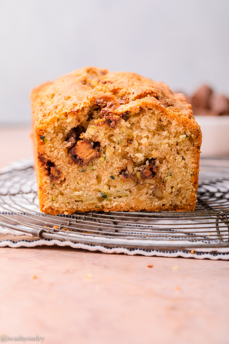 Baked Zucchini Bread slice on wire rack. 