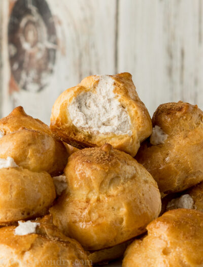 I never knew making homemade cream puffs was so easy! These Churro Cream Puffs are brushed with honey and dusted with cinnamon and sugar. The filling is a delightful cinnamon flavored whipped cream!