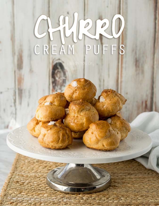 I never knew making homemade cream puffs was so easy! These Churro Cream Puffs are brushed with honey and dusted with cinnamon and sugar. The filling is a delightful cinnamon flavored whipped cream! 