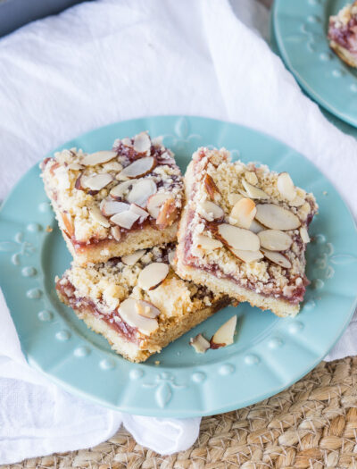 These soft and tender Raspberry Almond Bars have a shortbread cookie type crust and a wonderful almond flavor!