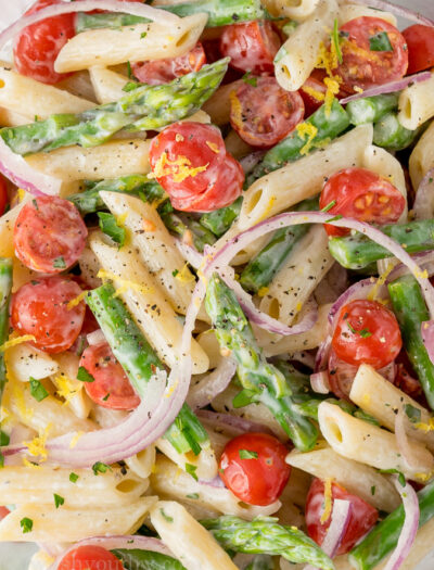 This Asparagus Pasta Salad is a cool and refreshing pasta salad that is bursting with flavors of lemon and parsley. Perfect spring salad!