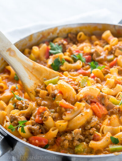 This Cheesy Sausage and Macaroni Skillet dinner recipe is super quick and easy, perfect for busy weeknights!