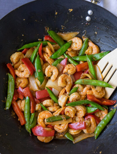 I'm in love with this Pacific Chili Shrimp Stir Fry. It tastes just like the popular new dish at Panda Express. Super quick and easy, my whole family loves it!