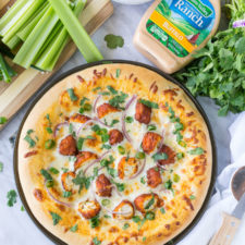 The combination of Buffalo Wings and Pizza in a creamy and cheesy Buffalo Ranch Chicken Pizza! So good with Hidden Valley's new Buffalo Ranch dressing!