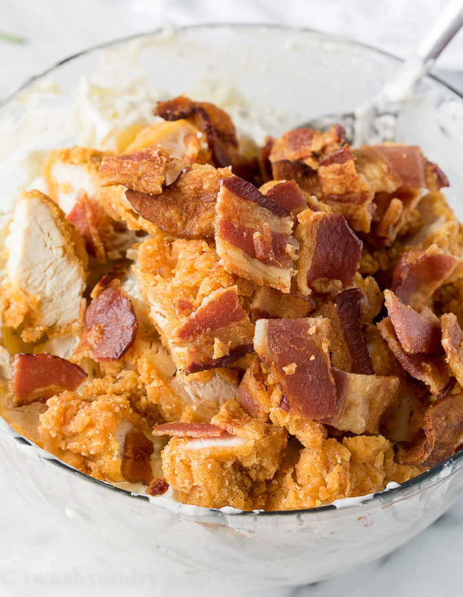 This Chicken Bacon Ranch Potato Salad is full of crispy chicken, bacon and creamy ranch dressing! Everyone loves this simple salad!