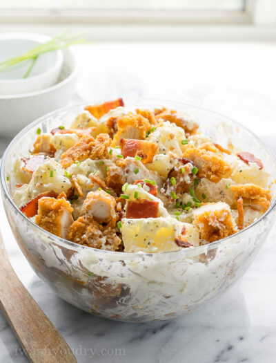 This Chicken Bacon Ranch Potato Salad is full of crispy chicken, bacon and creamy ranch dressing! Everyone loves this simple salad!