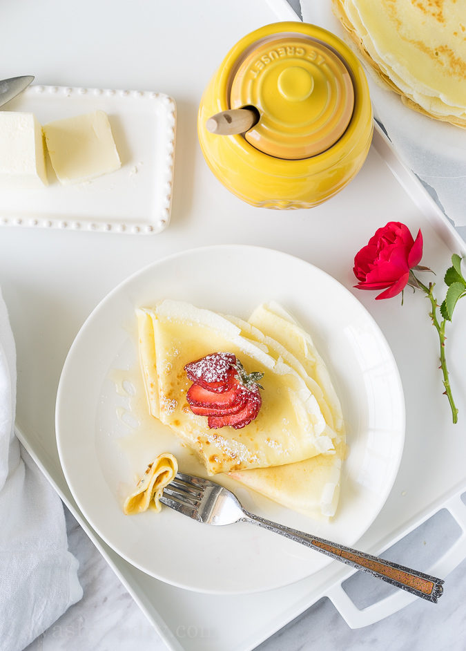 These Honey Butter Crepes are super simple to make and are filled with soft butter then drizzled with sweet honey. Perfect for breakfast in bed!