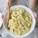 I love making this 5 minute Cheesy Zucchini Rice recipe for a quick and easy side dish! Even my kids get in there and help too!