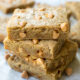 A close up of a stack of blond brownies