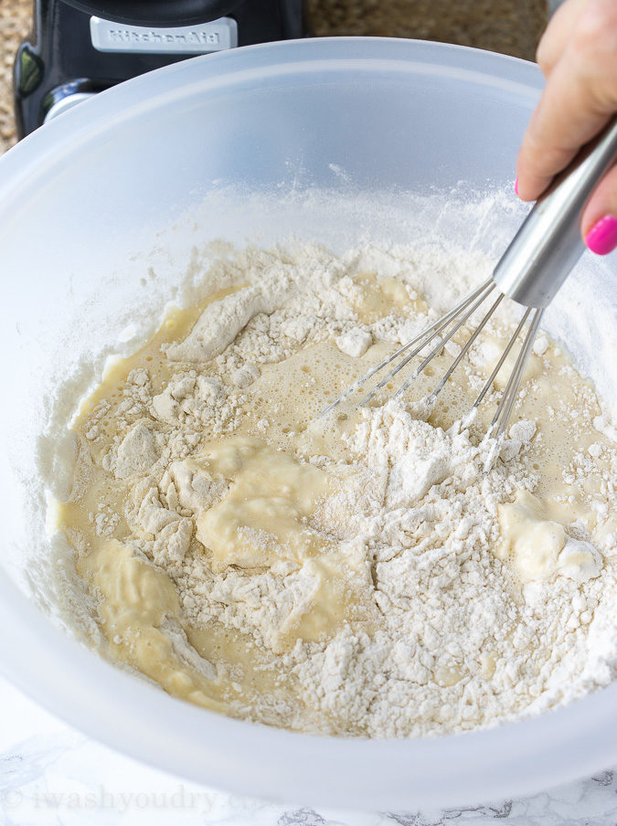 Mixing bowl with waffle batter inside.