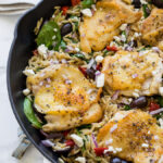 This Greek Chicken Skillet is a one pan meal that's full of bold flavors and made super quick! You'll love this recipe!